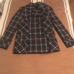 Woman’s plaid jacket